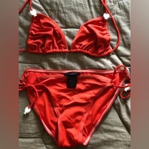 Red Marc Jacobs string bikini and cover-up.